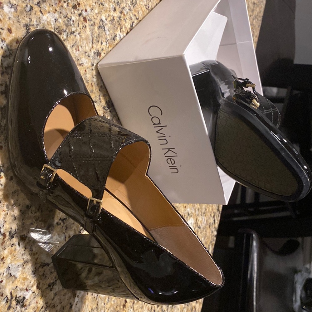Black Calvin Klein Patent Leather Women’s Shoe size 8. Worn once on carpet.